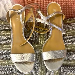 Michael Kors silver sandals.